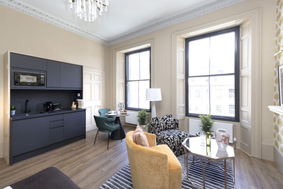 Studio with bed and kitchen