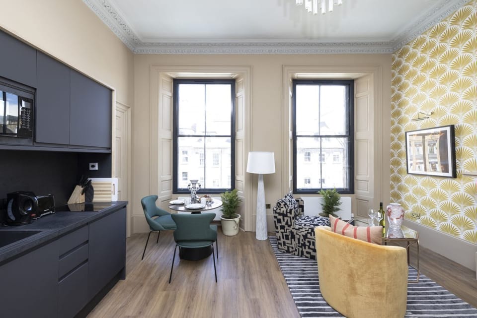 Studio with bed and kitchen