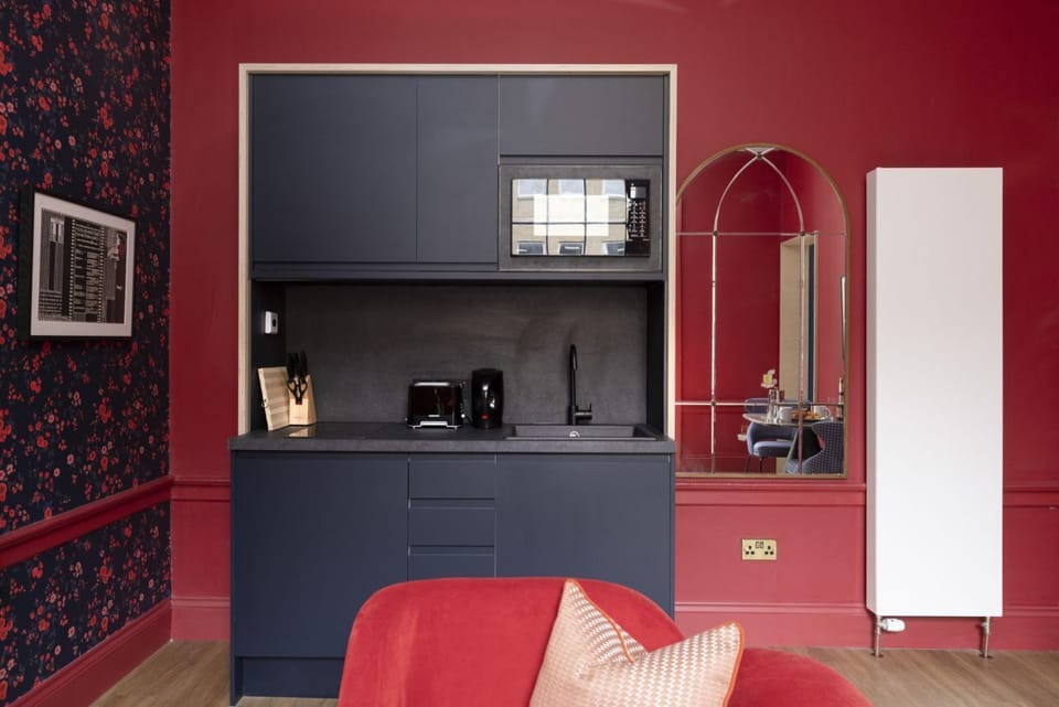 Studio with bed and kitchen
