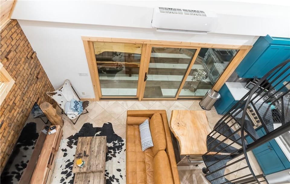 View of the living room from the loft in the ground level house