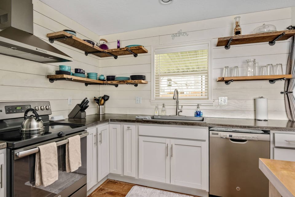 The kitchen is spacious and efficient. Perfect place to prepare a family meal or a quick treat. Grab some seafood from the coast and have fun!