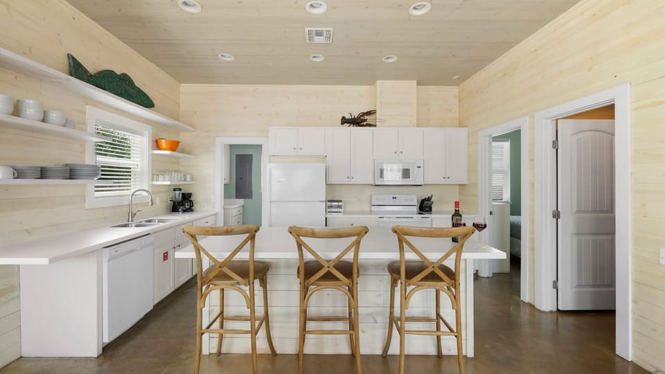 Full Kitchen with White Cabinets & Breakfast Bar