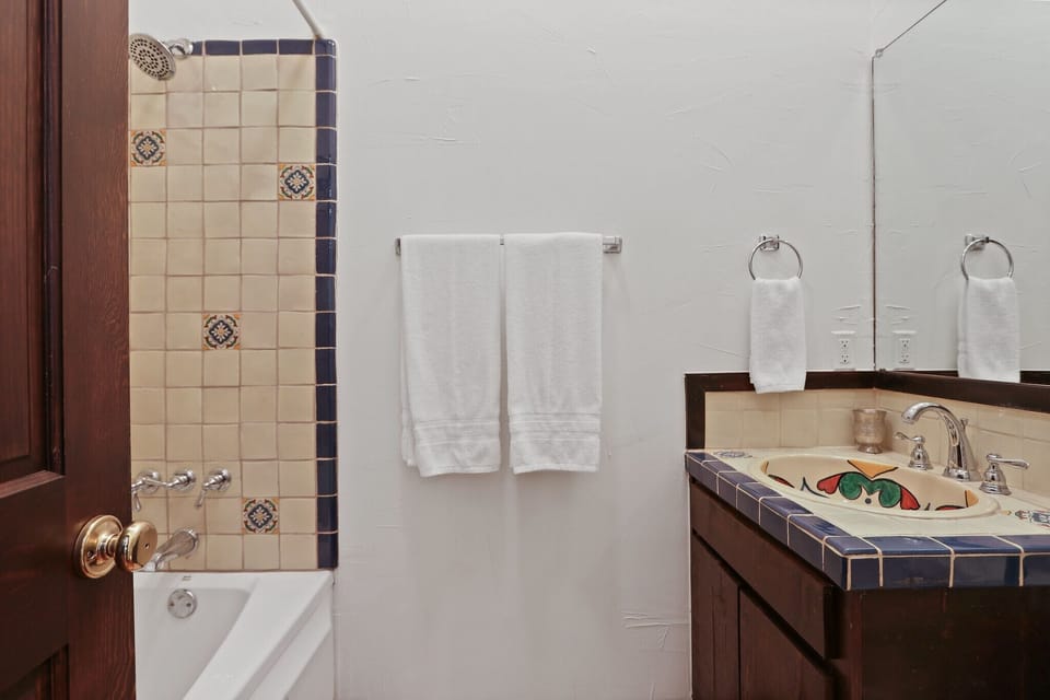 Full bathroom with a standing shower
