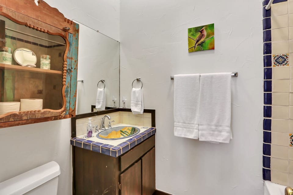 Full bathroom with a standing shower