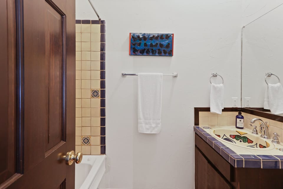 Full bathroom with a standing shower