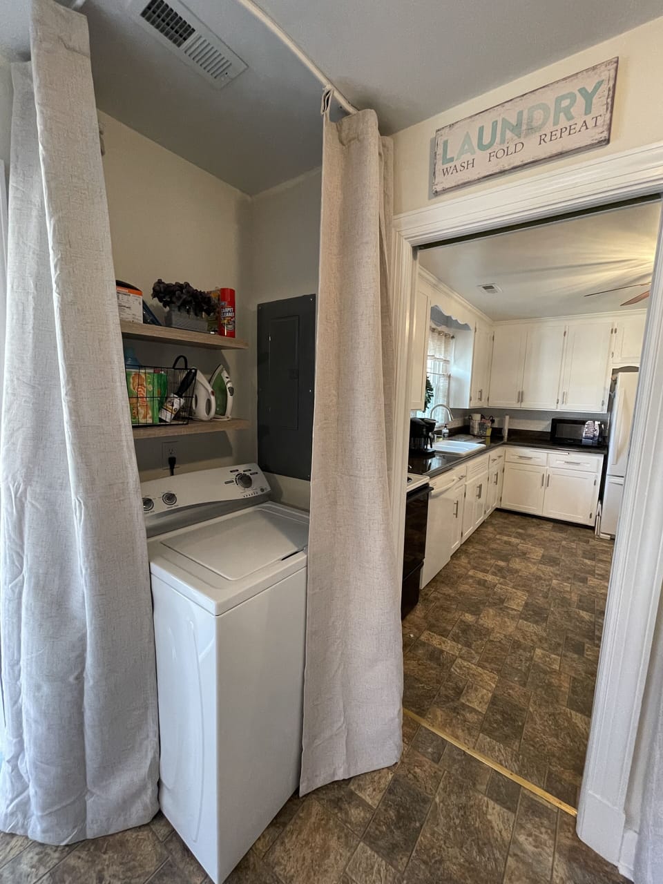 Laundry room has washer and dryer