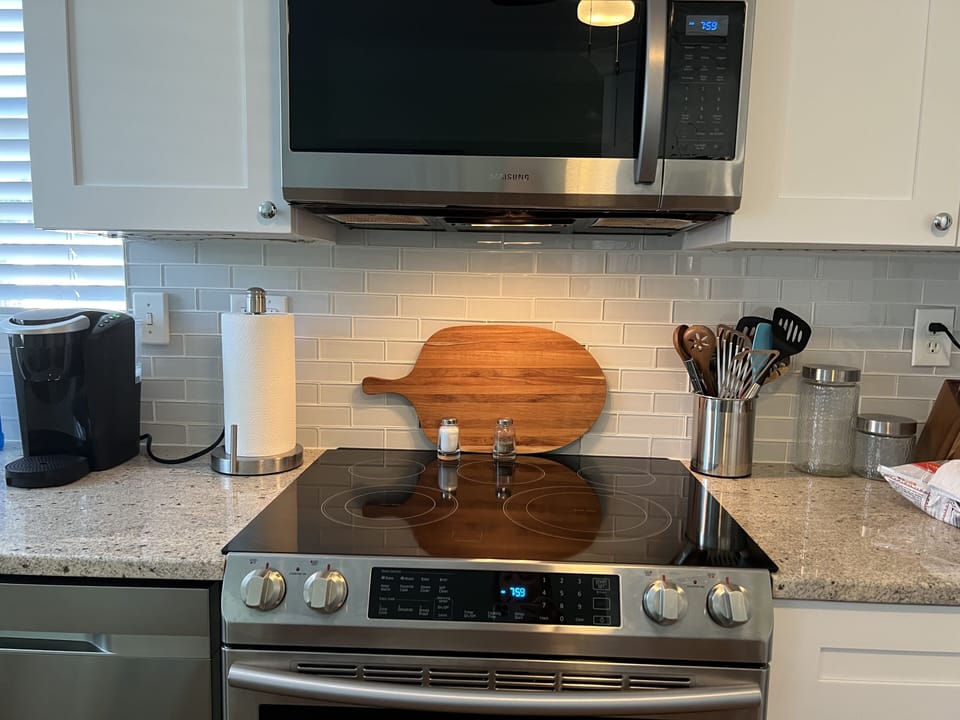 New appliances and beautiful granite making this a welcoming kitchen.