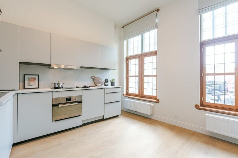 The kitchen is spacious and has plenty of natural light. It is modern and fully equipped, so you can cook up a meal whenever you want.