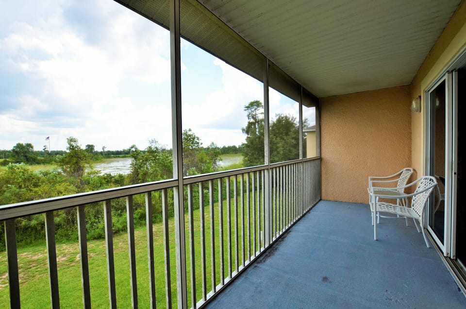 screened patio with access from master bedroom and living room