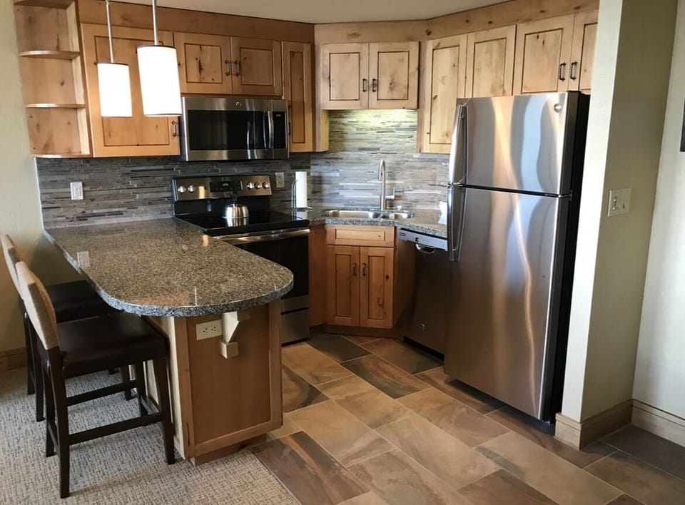 Full kitchen with island seating area
