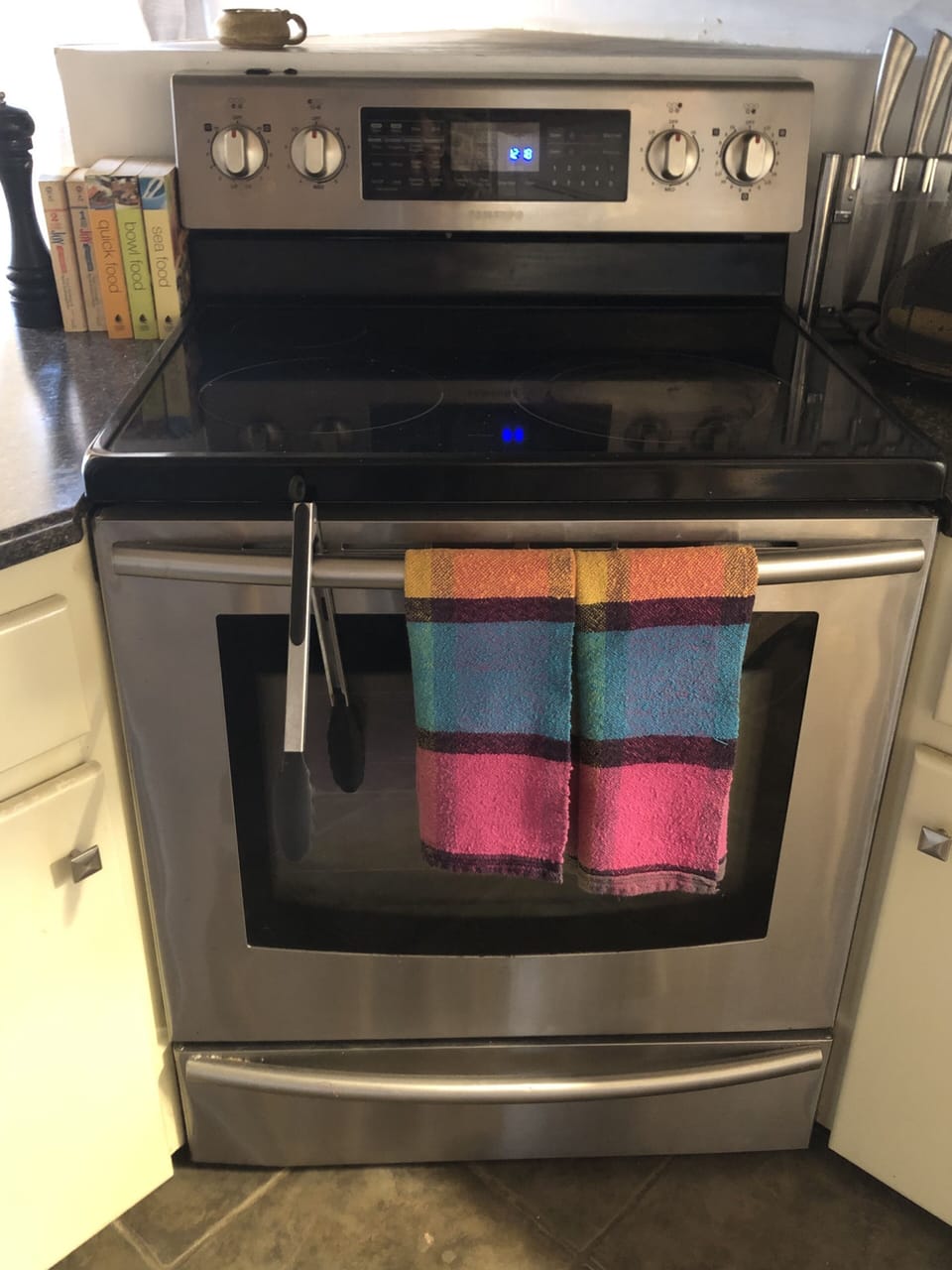 Washer and dryer in the lower secondary bathroom. Includes a walk-in shower.