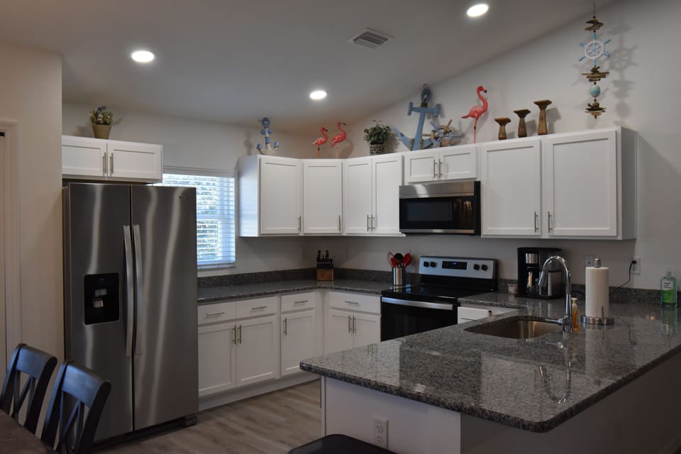 Beautiful kitchen with a lot of utensils