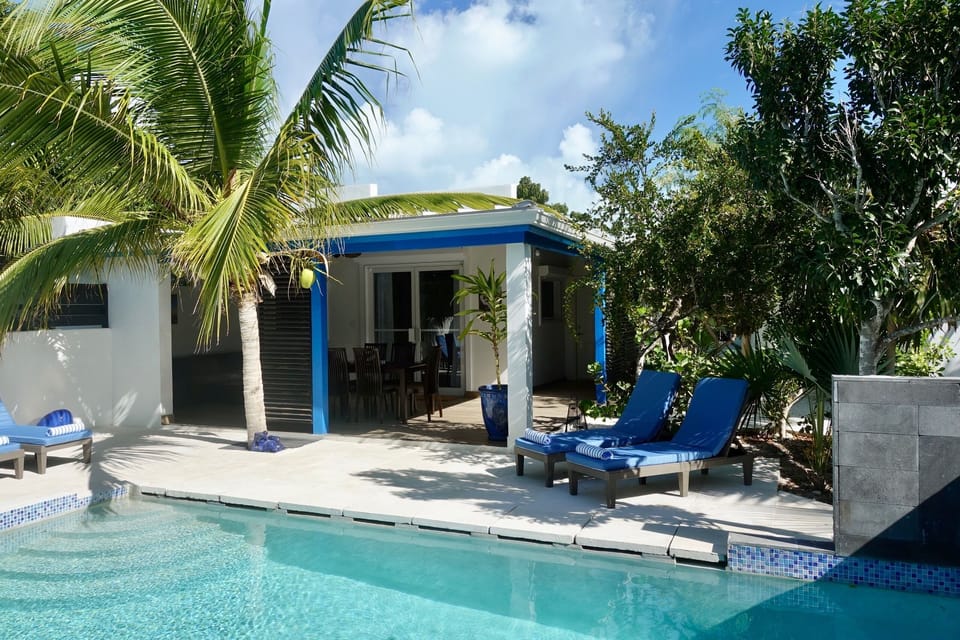 primary suite steps aways from the pool
