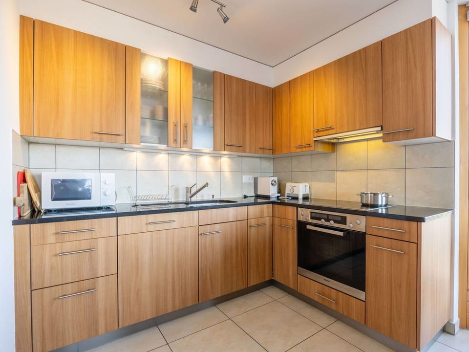 Cabinetry, Countertop, Property, Furniture, Tap, Building, Kitchen, Sink, Kitchen Stove, Wood