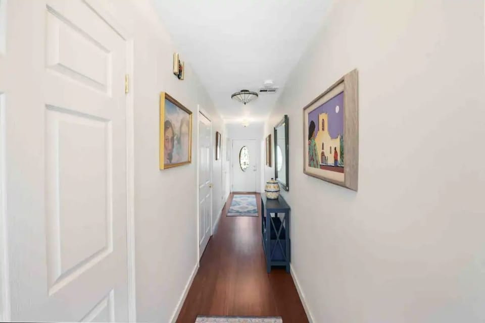 Southwestern art fills the entryway and front hall of Guadalupe House.