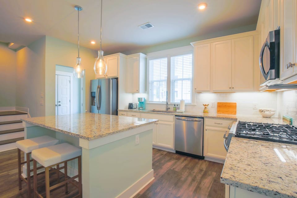 The main entryway for the house is through the back door near the kitchen.