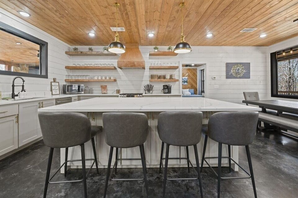 Kitchen: Bright, airy space with modern finishes, ideal for culinary adventures! Enjoy the view!area