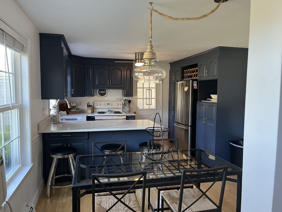Eat-in kitchen with AC,  granite,  freshly painted cabinets
