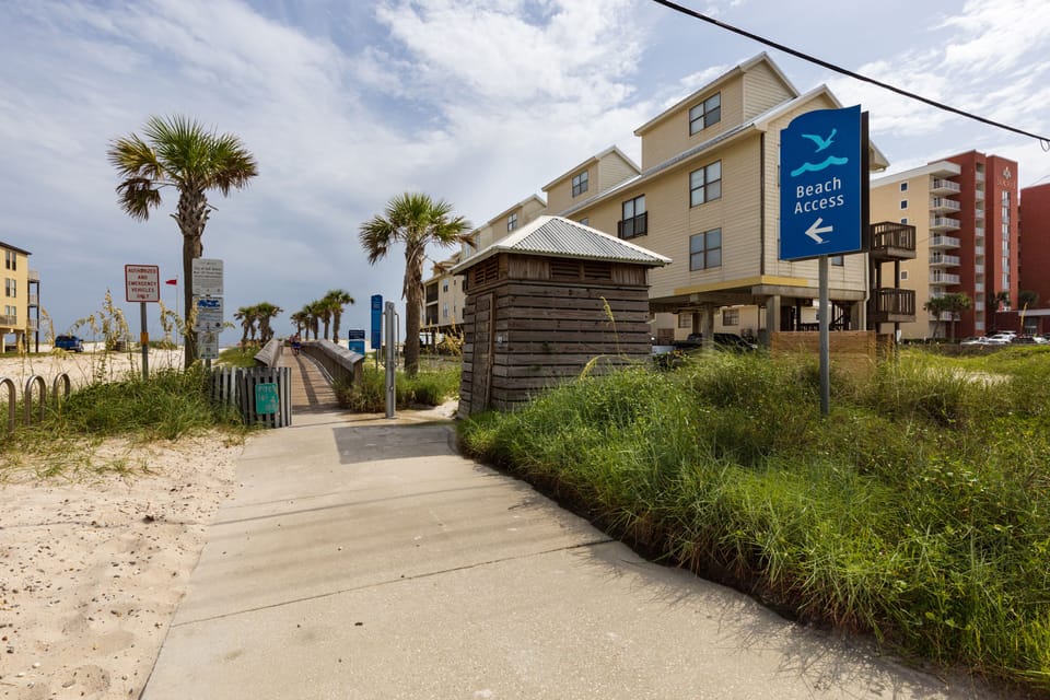 Public beach access with wash stations and changing area