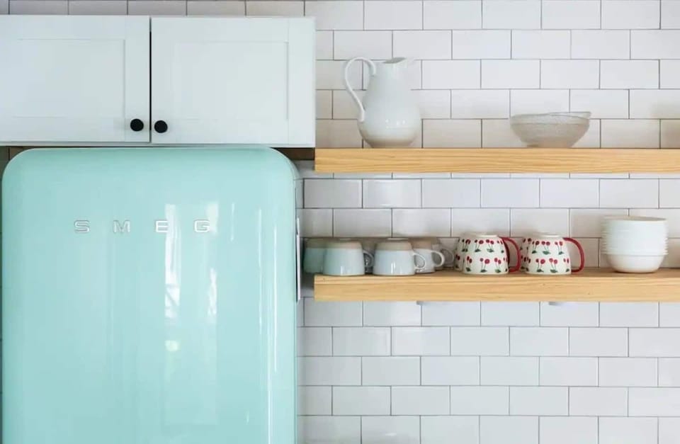The Smeg refrigerator sets a fun and bright tone for the Cottage.