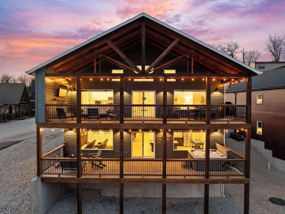 Upper Deck - Outdoor TV, Fireplace, Dining Table
Lower Deck - Private Hot Tub and Outdoor Seating