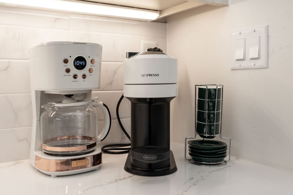 Coffee pot and Nespresso. We get you started with several Nespresso pods. 