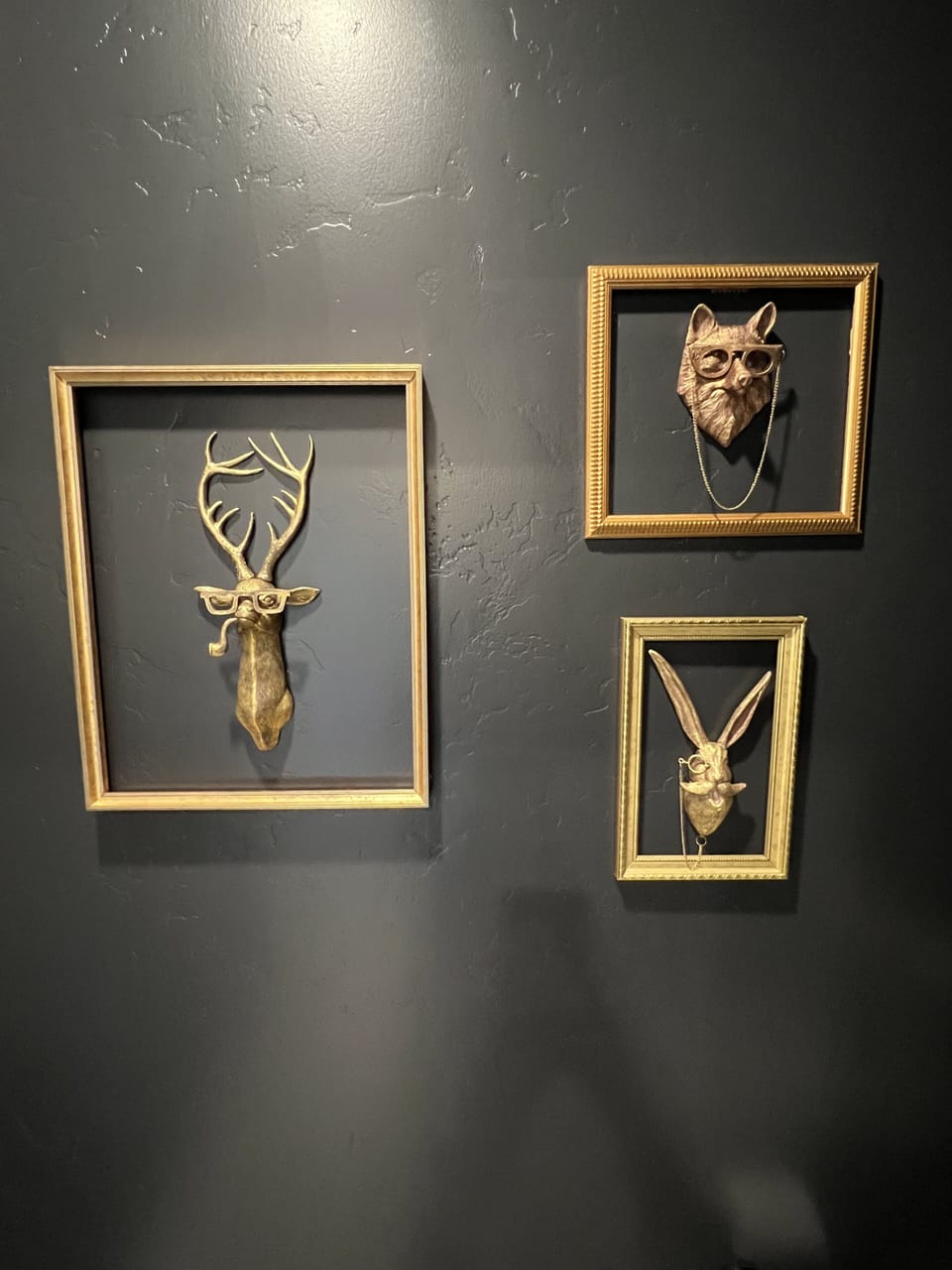 A fun photo backdrop surprise with these cute and gilded woodland animals.