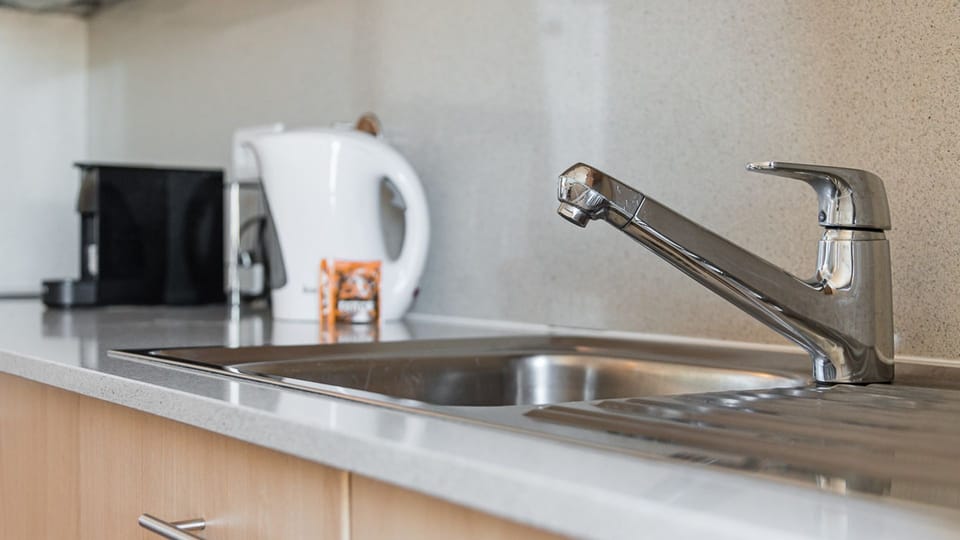 Practical kitchenette, equipped with all the supplies you might need to cook your homemade meals #modern #lovelystay #airbnbporto
