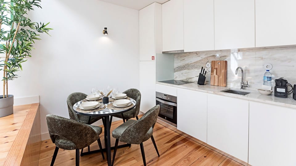 Dining table for four, right next to our fully equipped kitchenette #modern #stunning