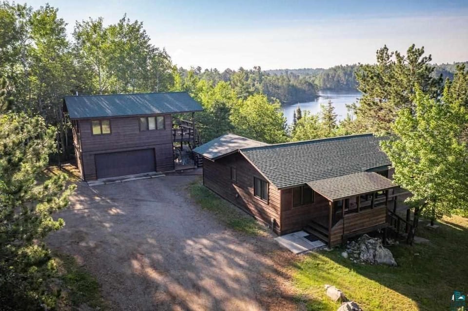 Main Cabin (right) and Guest Cabin over Garage (left)