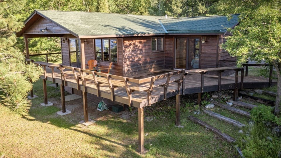 cabin with wrap-around deck and built-in seating