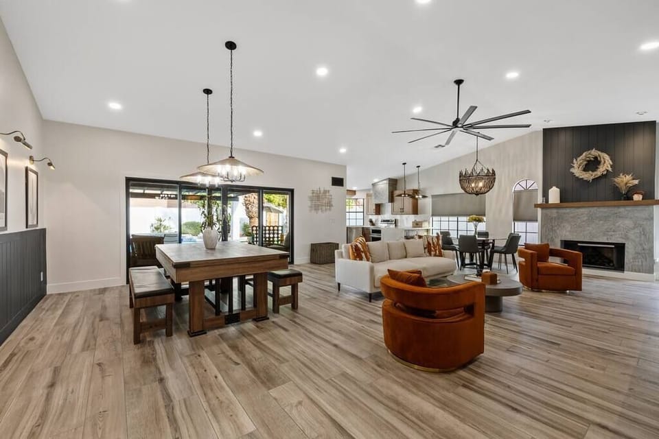 Open space living room, including luxury seating with a perfect view out into the backyard!