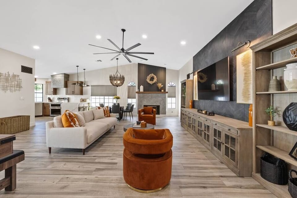 Open space living room, including luxury seating and 80 inch Smart TV! (2)