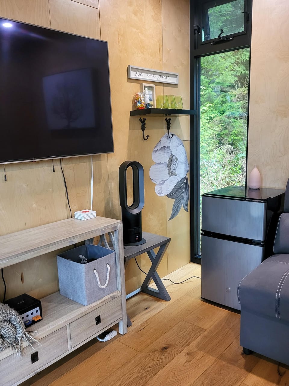 Smart TV and bar fridge in TV Room Cottage (Auxbox).