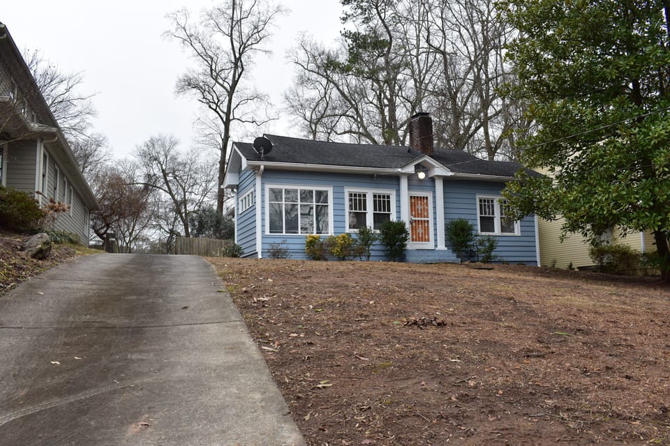 Front View showing driveway for off street parking