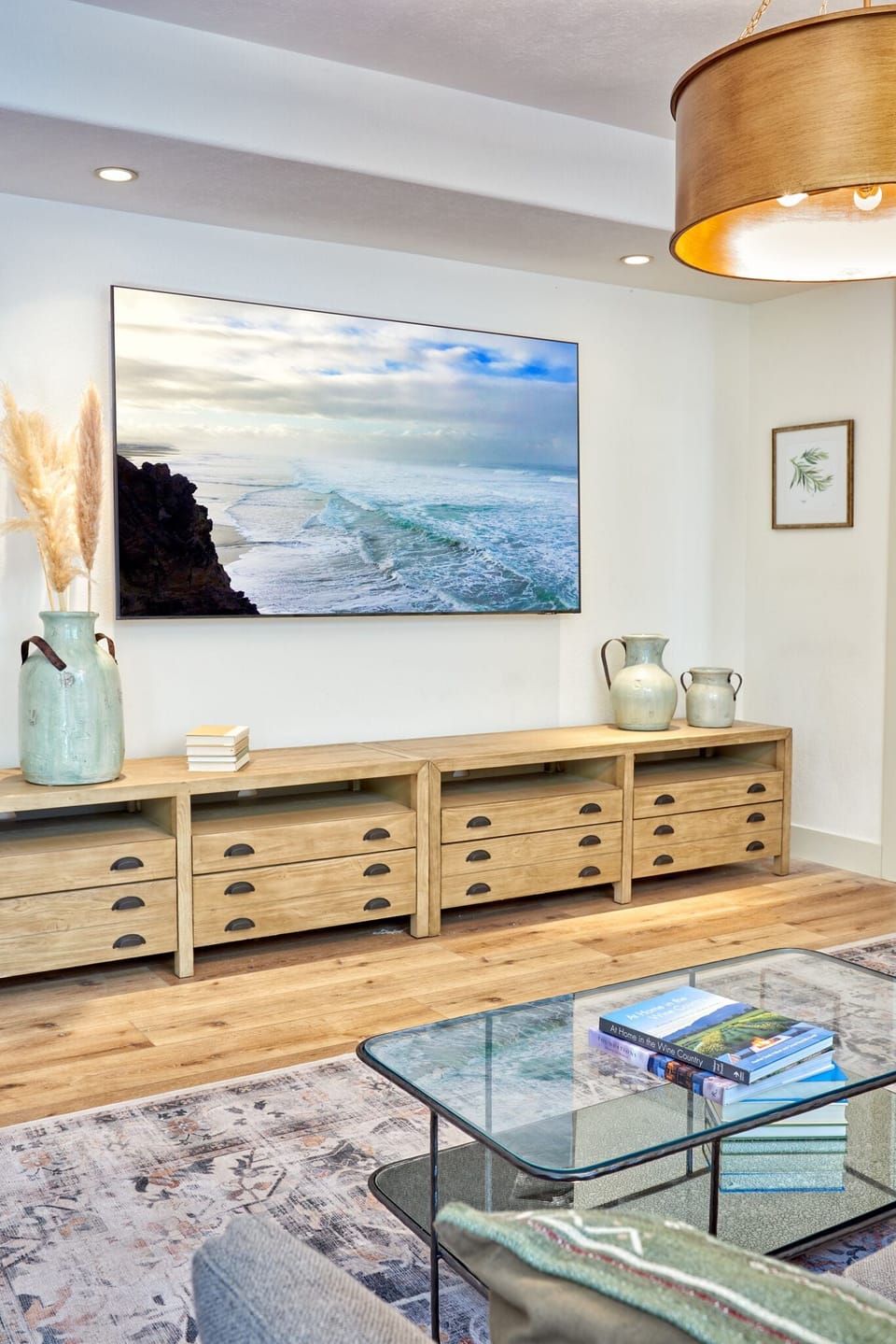 Second living room with 85" smart TV off of kitchen