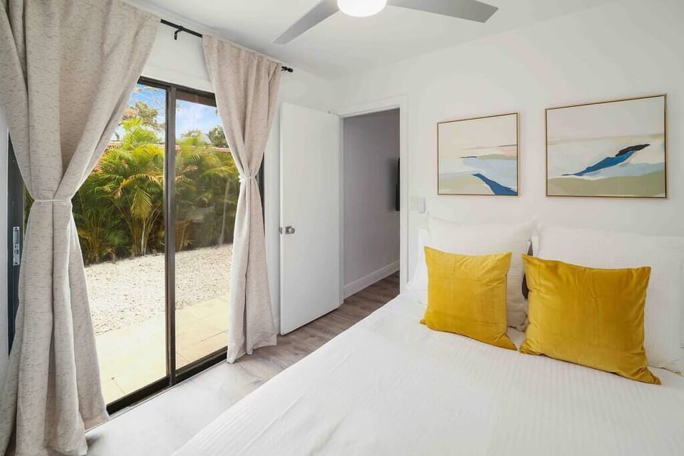 bedroom 2 with access to backyard