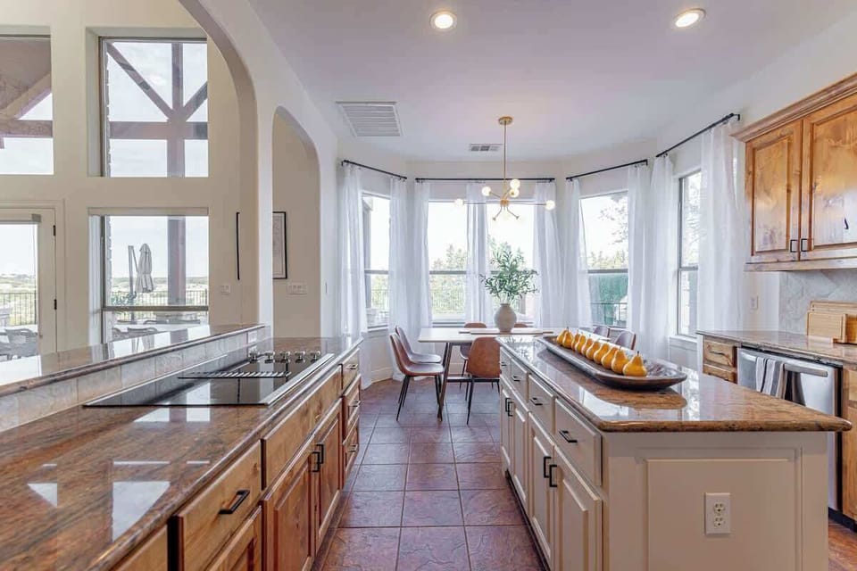 Home chefs will enjoy cooking in the modern kitchen with stainless steel appliances and plenty of counter space.