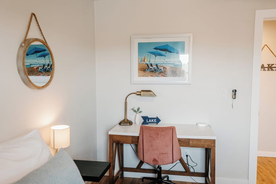 Queen Bedroom + ceiling fan + dedicated workspace