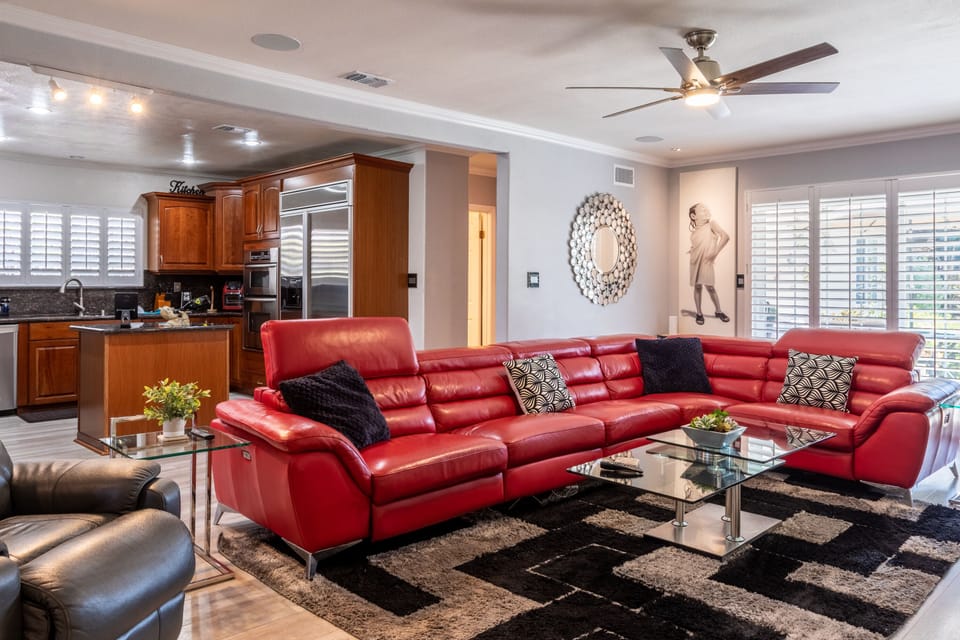 In the den/TV area you'll relax in a recliner leather sofa and chair.