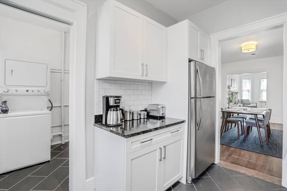 Fully equipped kitchen, and laundry area