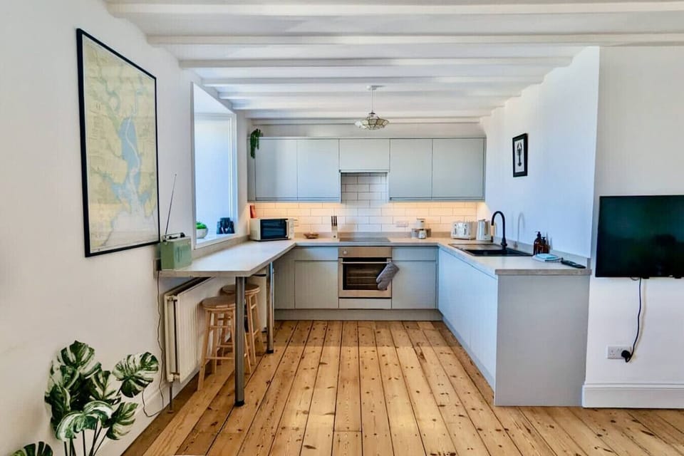 Enjoy the modern open plan kitchen for nights dining in and start the day with sunrise views from the breakfast bar.