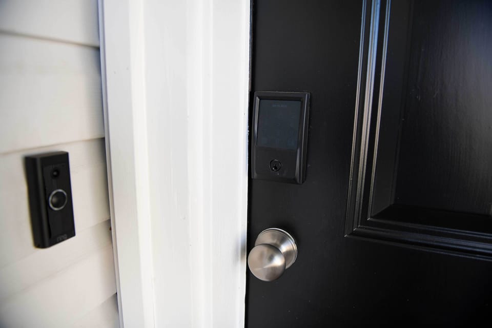 Front door with keyless lock and ring doorbell 