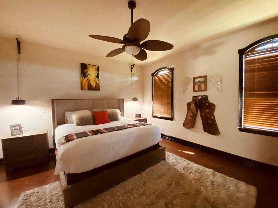 Ode to the Cowboys: Ranch Foreman’s Master in the Family Suite with 56 in flatscreen tv