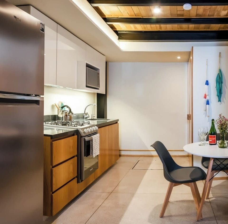 Our well-equipped kitchen with a dining table has everything you need to enjoy cooking during your stay.