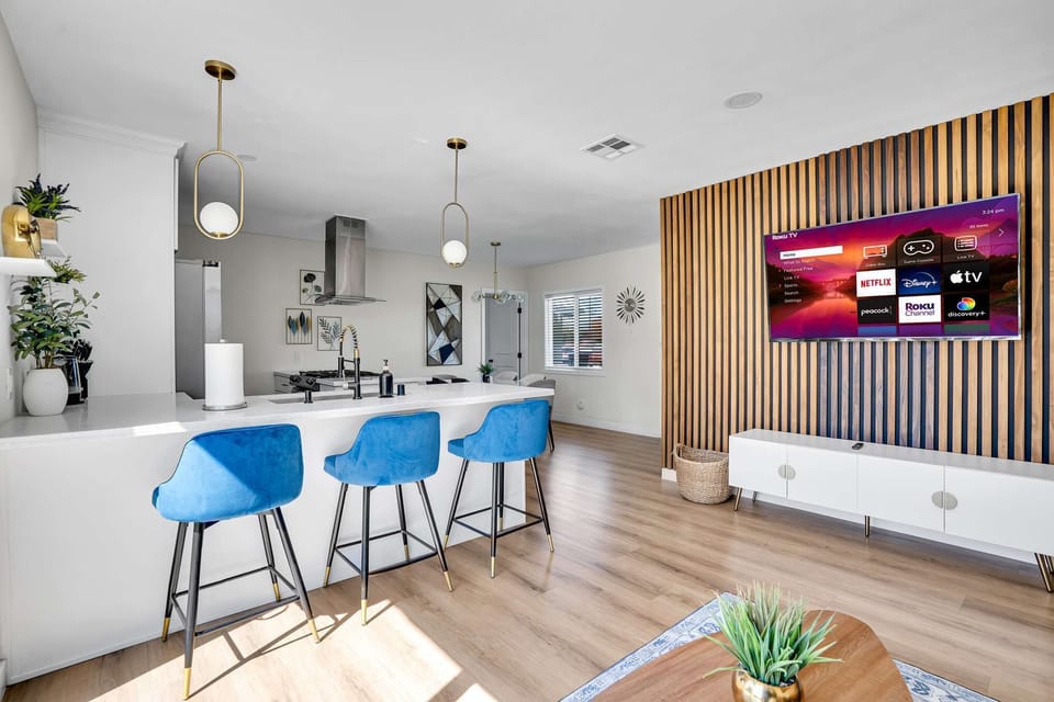 Open-concept living area with seamless flow from kitchen to living room.