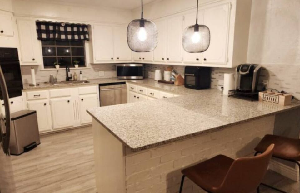 Discover the heart of our home, a spacious kitchen to cook your comfort foods.