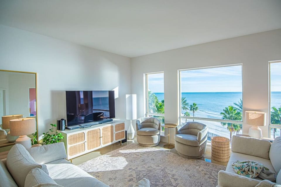 Gulf Front views from the living room! The condo also overlooks the main pool and lawns.