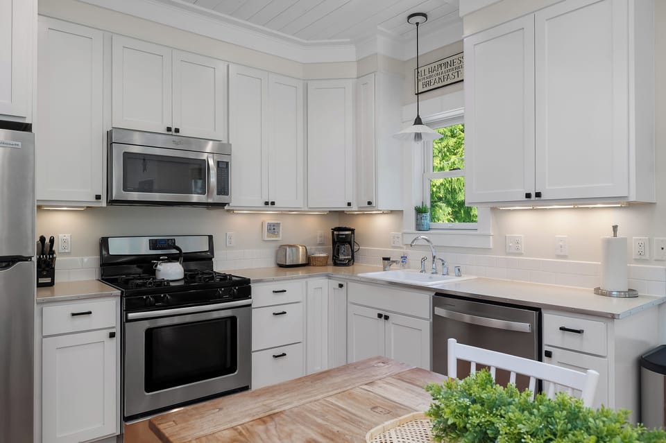 The kitchen is equipped with a gas range