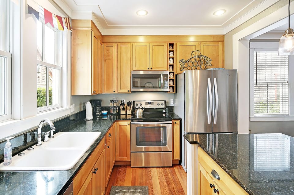 The fully equipped kitchen is designed for effortless meals